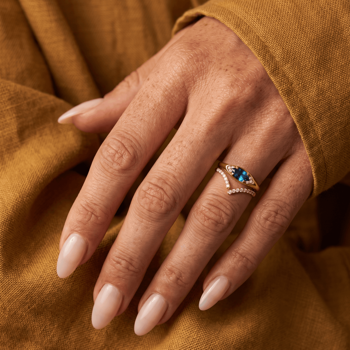 Blue Topaz Evil Eye & Infinite Rings